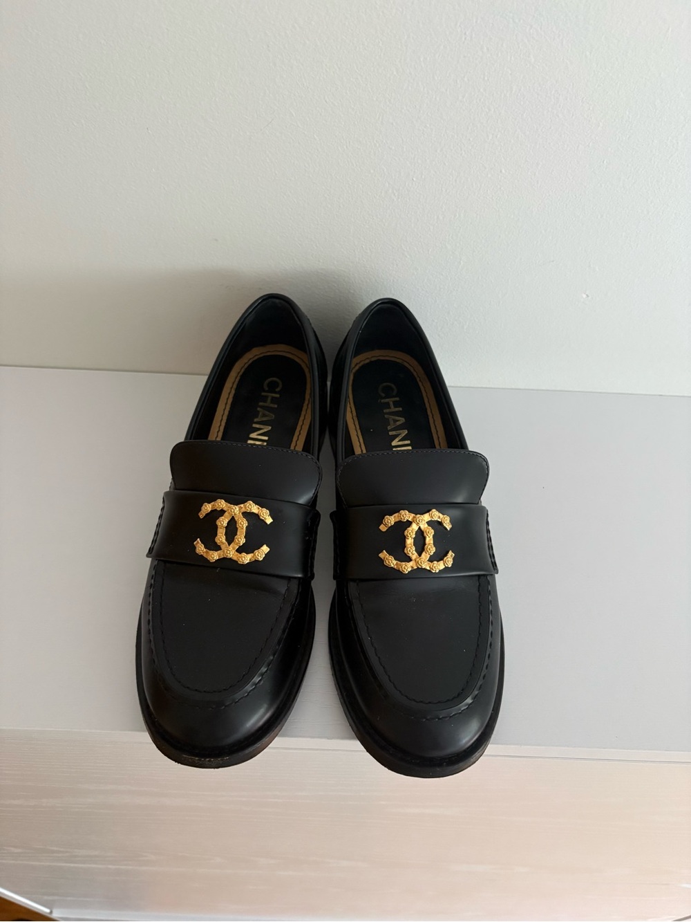 CHANEL Black Leather Loafers with Gold CC Logo